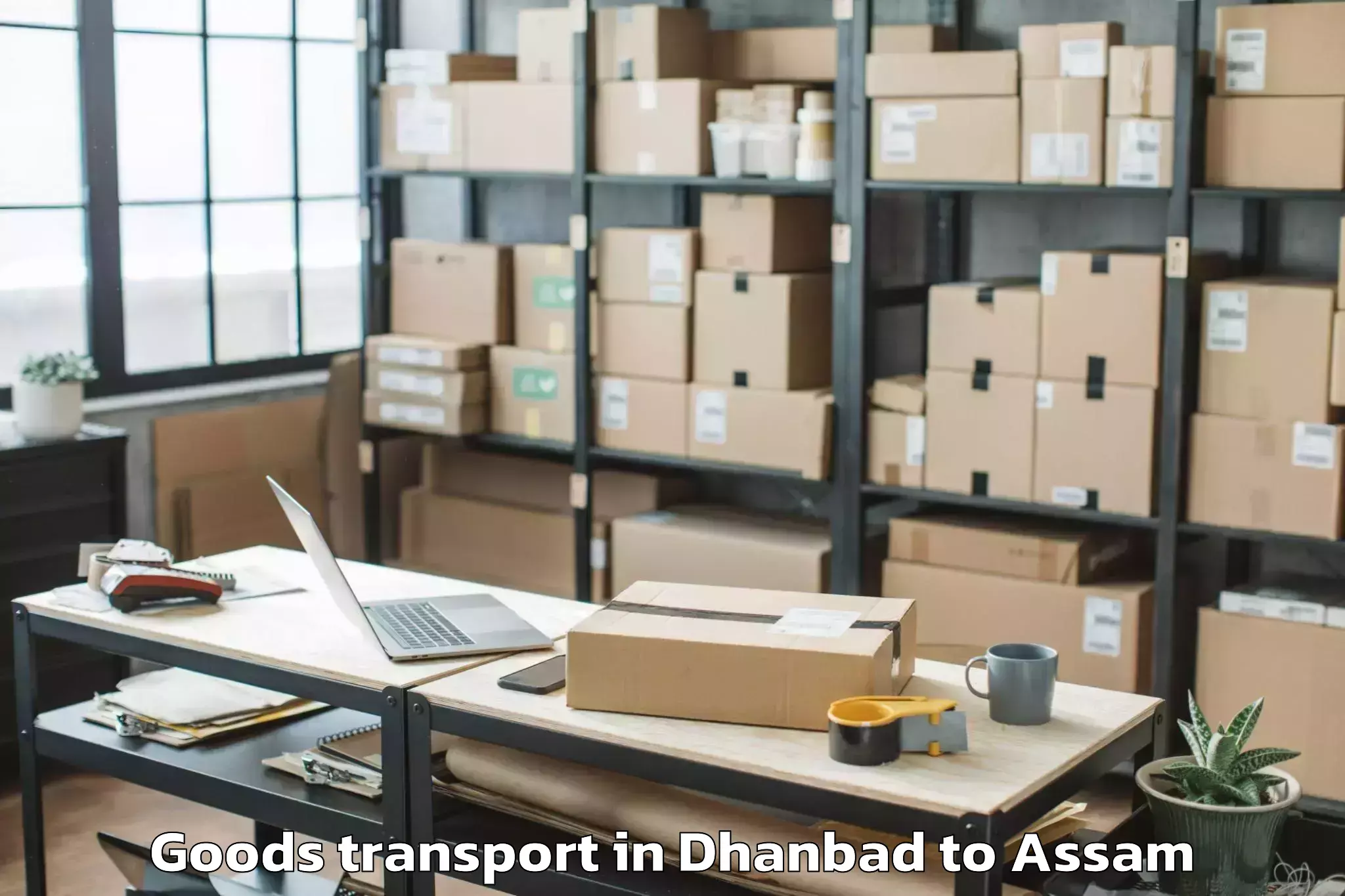 Easy Dhanbad to Guwahati University Goods Transport Booking